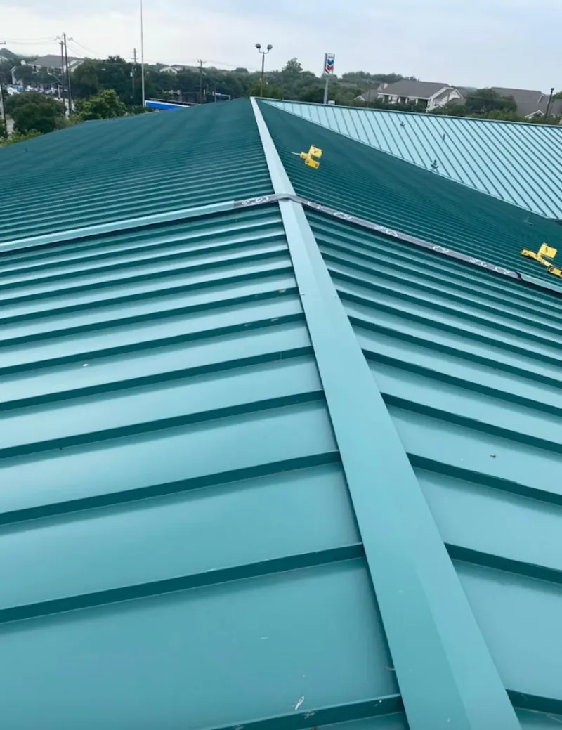 Green commercial metal roof ridge and valley for Metal Roof Repair in East Bethel